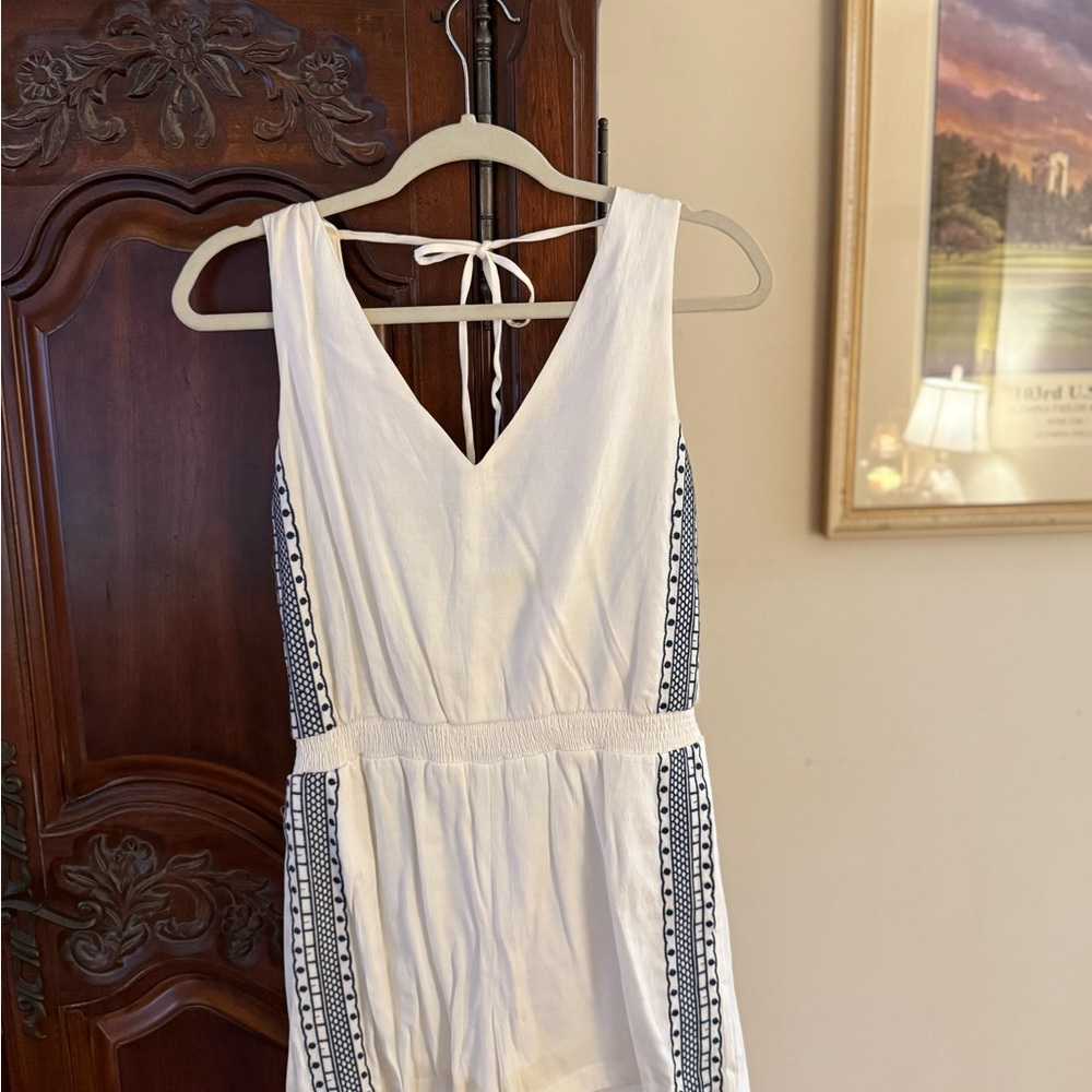 White Sleeveless Romper with Black Trim